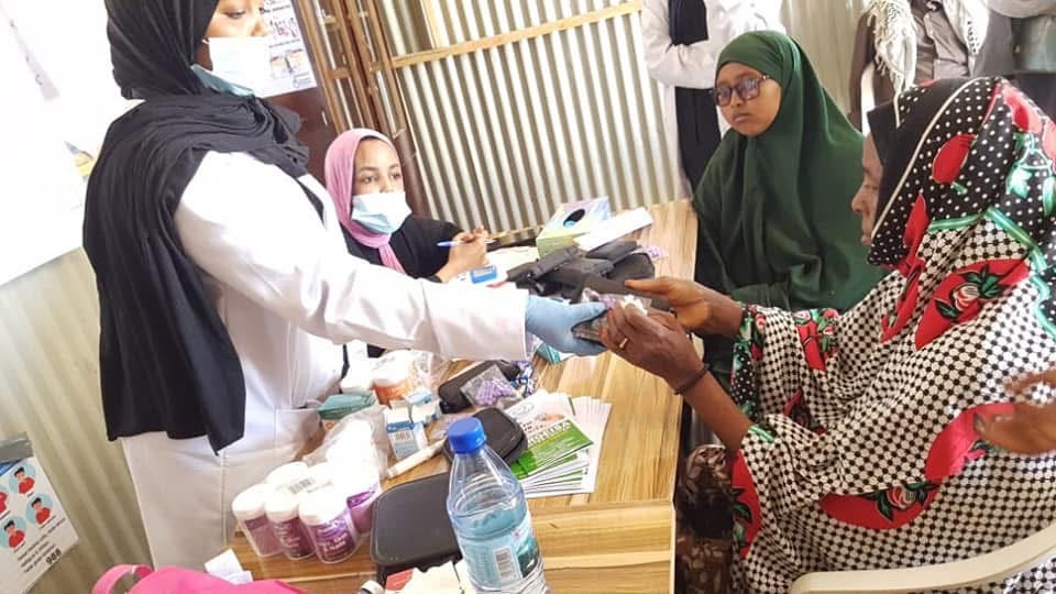 HDC staff providing medication and pharmacy support to a patient